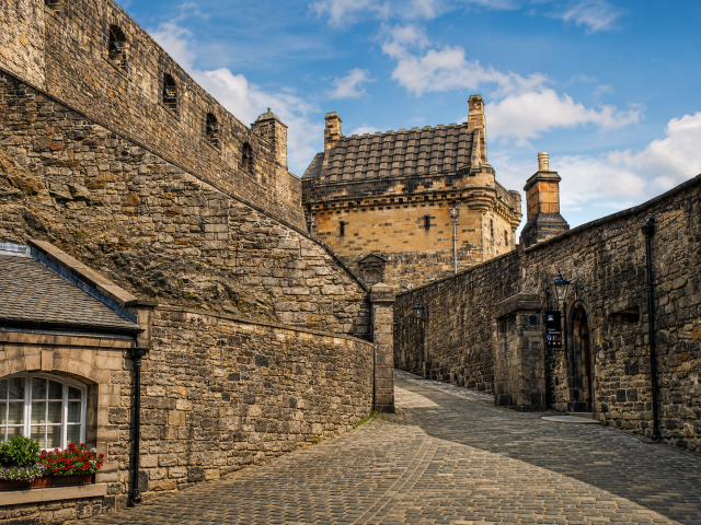 Sunlit stone courtyard of the castle
